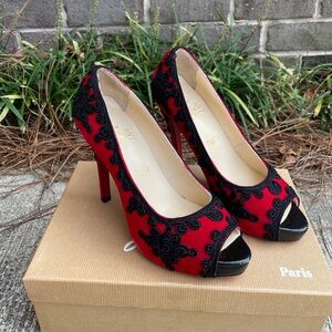 Vintage Louboutin- Red Open Toe heel with Black Passementerie details.